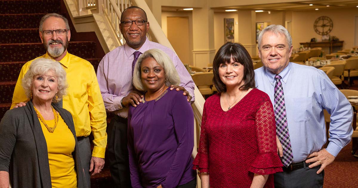 Sycamore Ridge staff members on stairs
