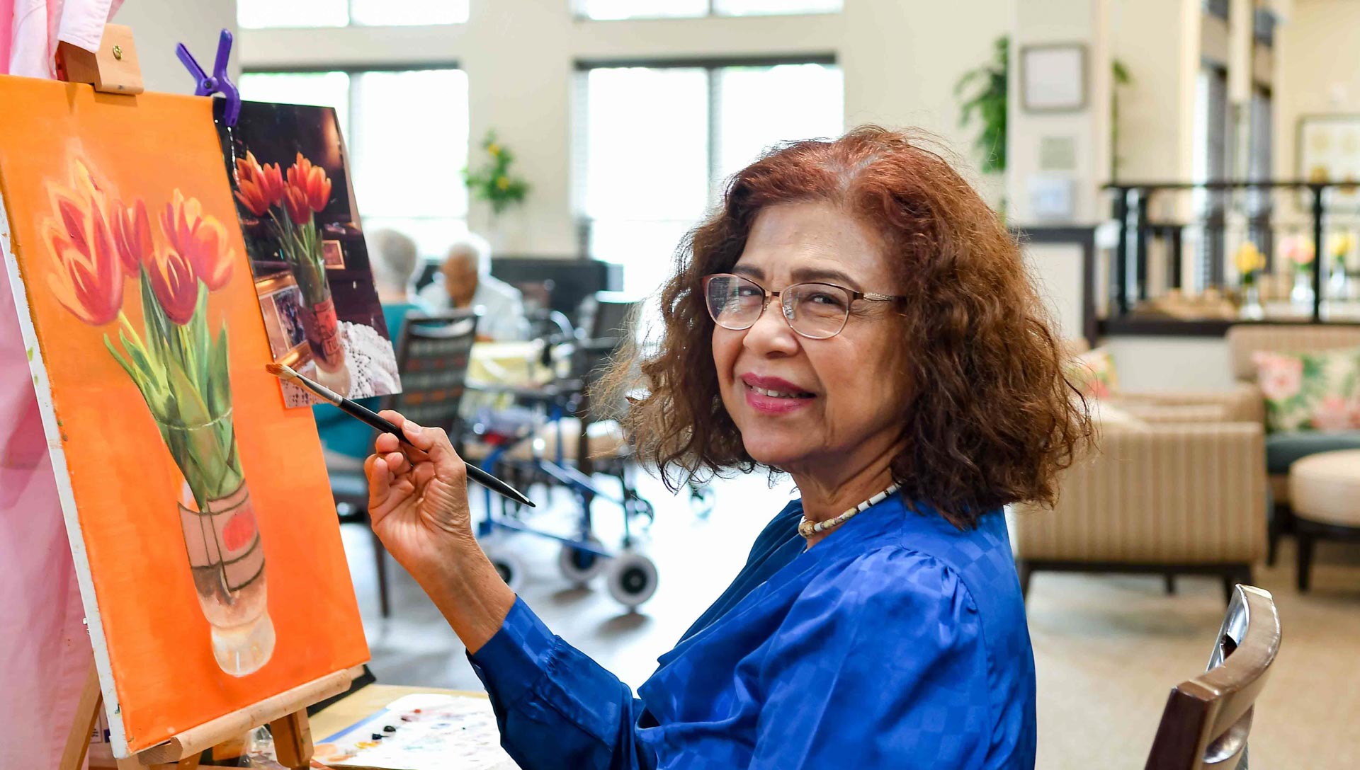 Sycamore Ridge resident painting